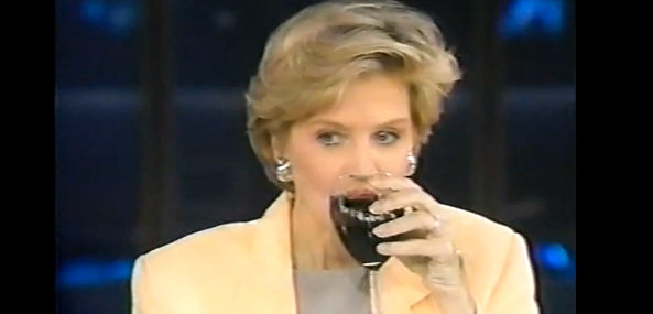 Diane Sawyer sipping red wine at anchor desk 