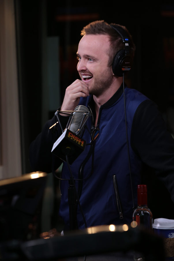 Aaron Paul laughing with the cast