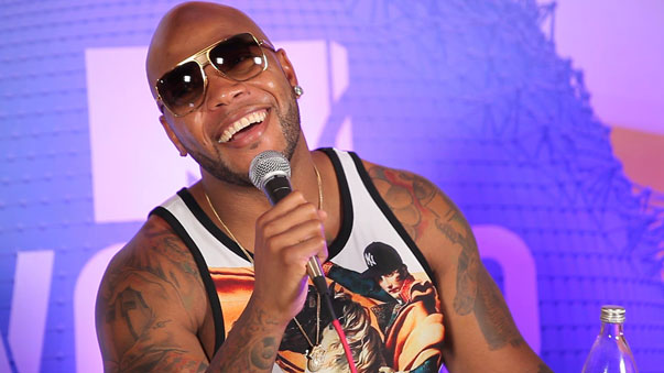 Flo Rida laughing with the cast