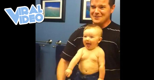 Viral Video: Baby Flexes Muscles with Dad
