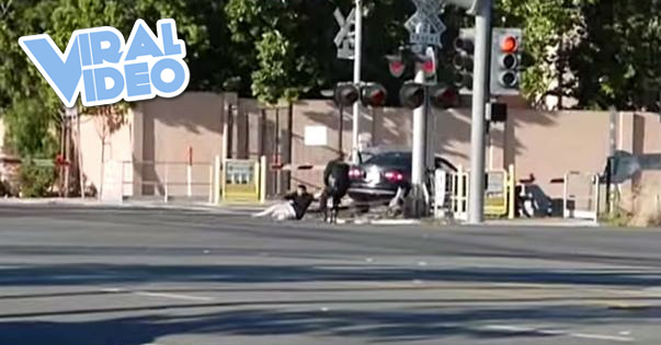 Viral Video: Officer pulls man from car seconds before train crash