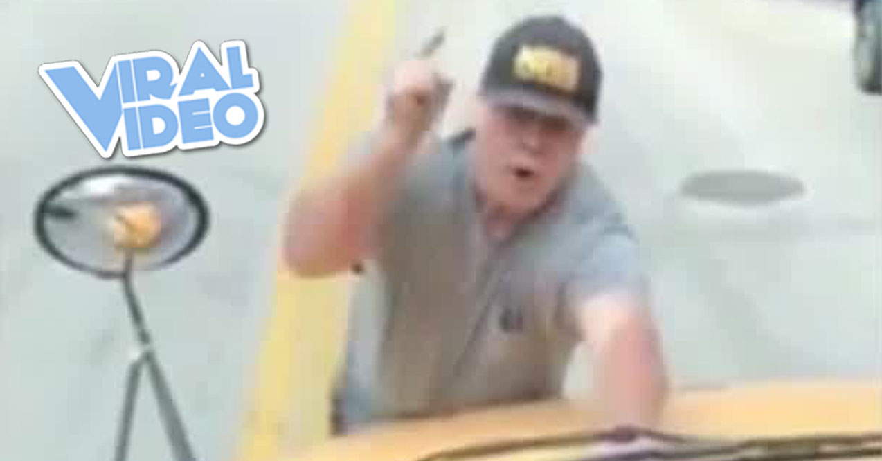 Viral Video: Angry Man Rides Hood Of School Bus