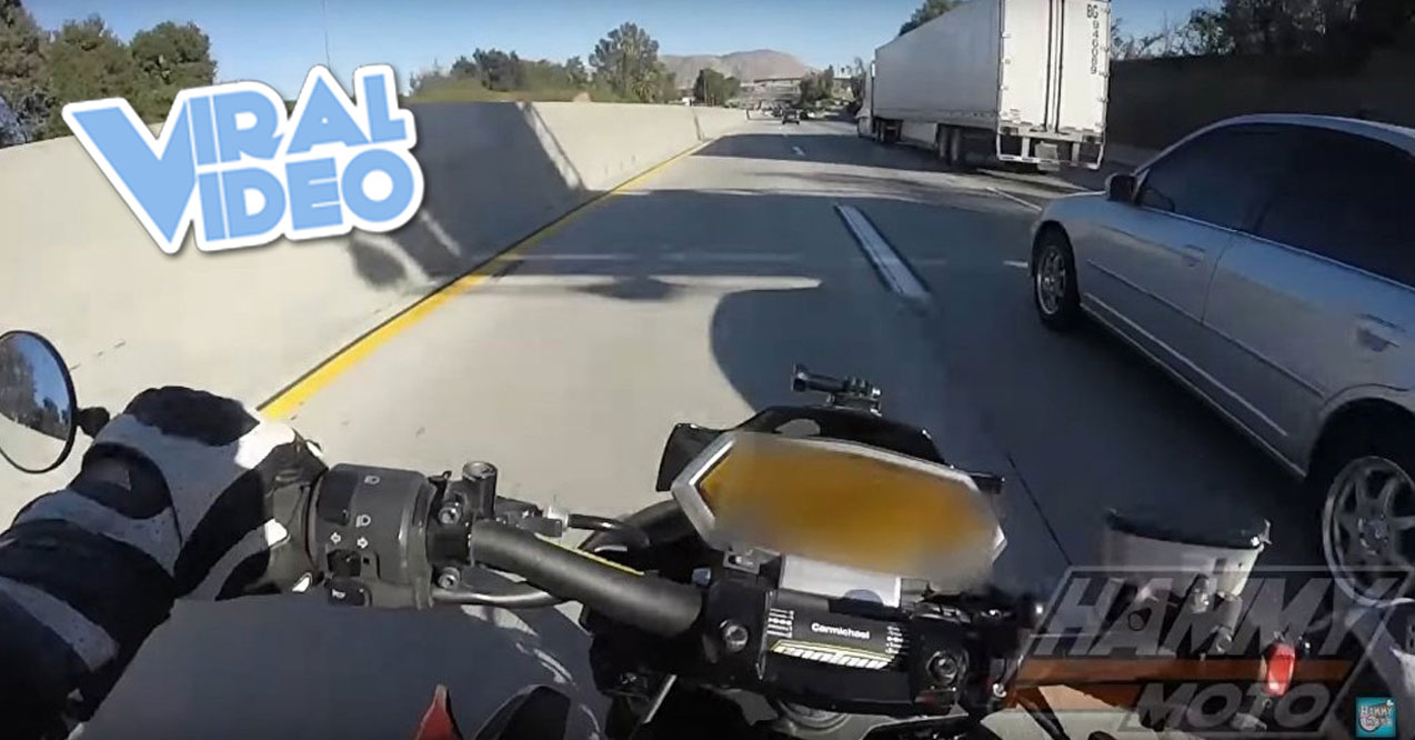 Viral Video: Biker vs Semi Truck